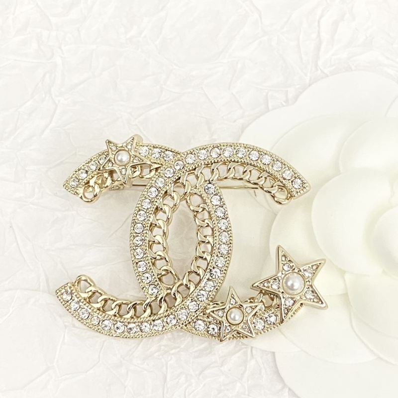 Ch*el brooches